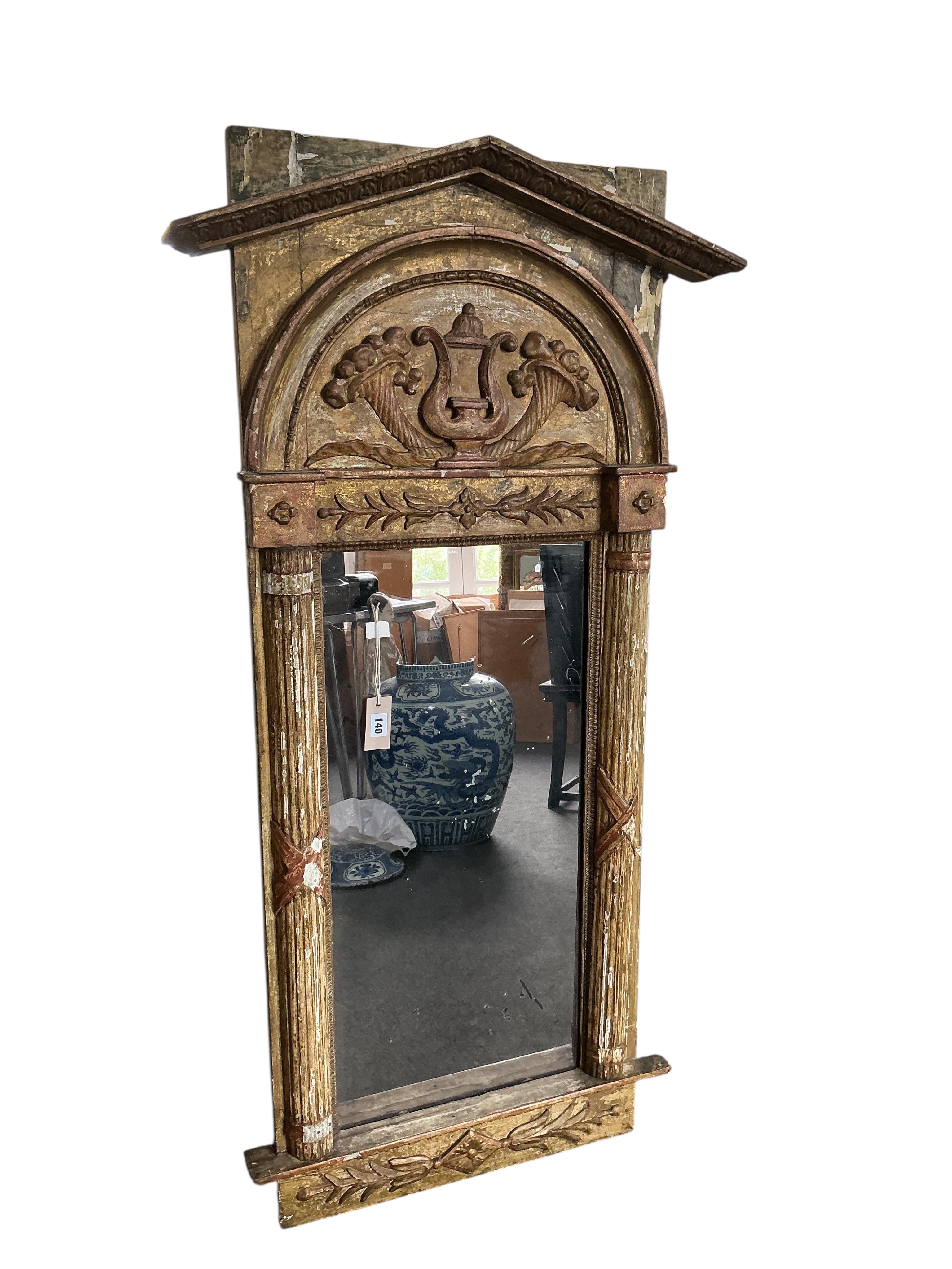 A 19th Italian giltwood and composition pier glass, width 70cm, height 140cm